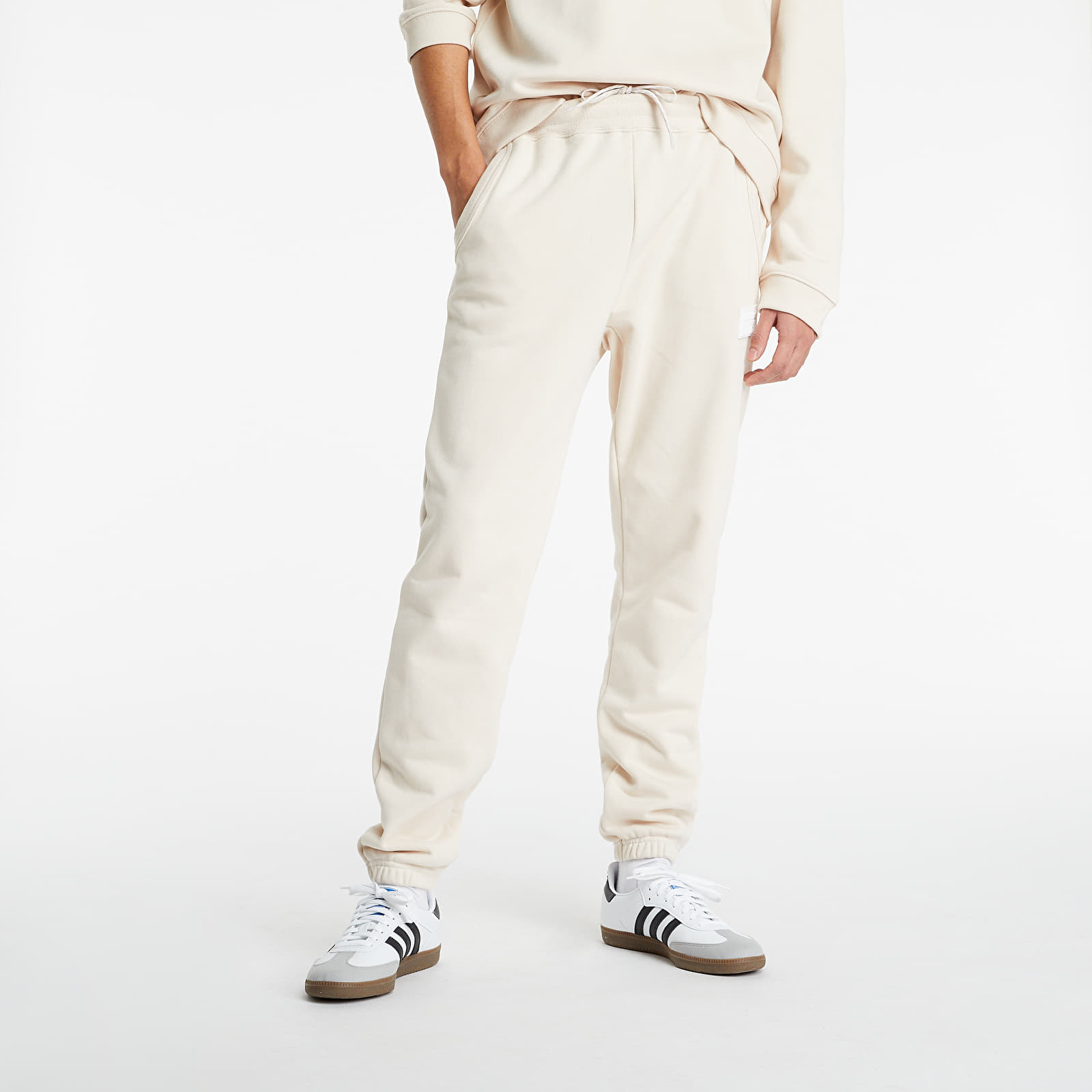 Дънки и панталони adidas R.Y.V. Silicone Double Linear Badge Sweatpants Halo Ivory 113425_M