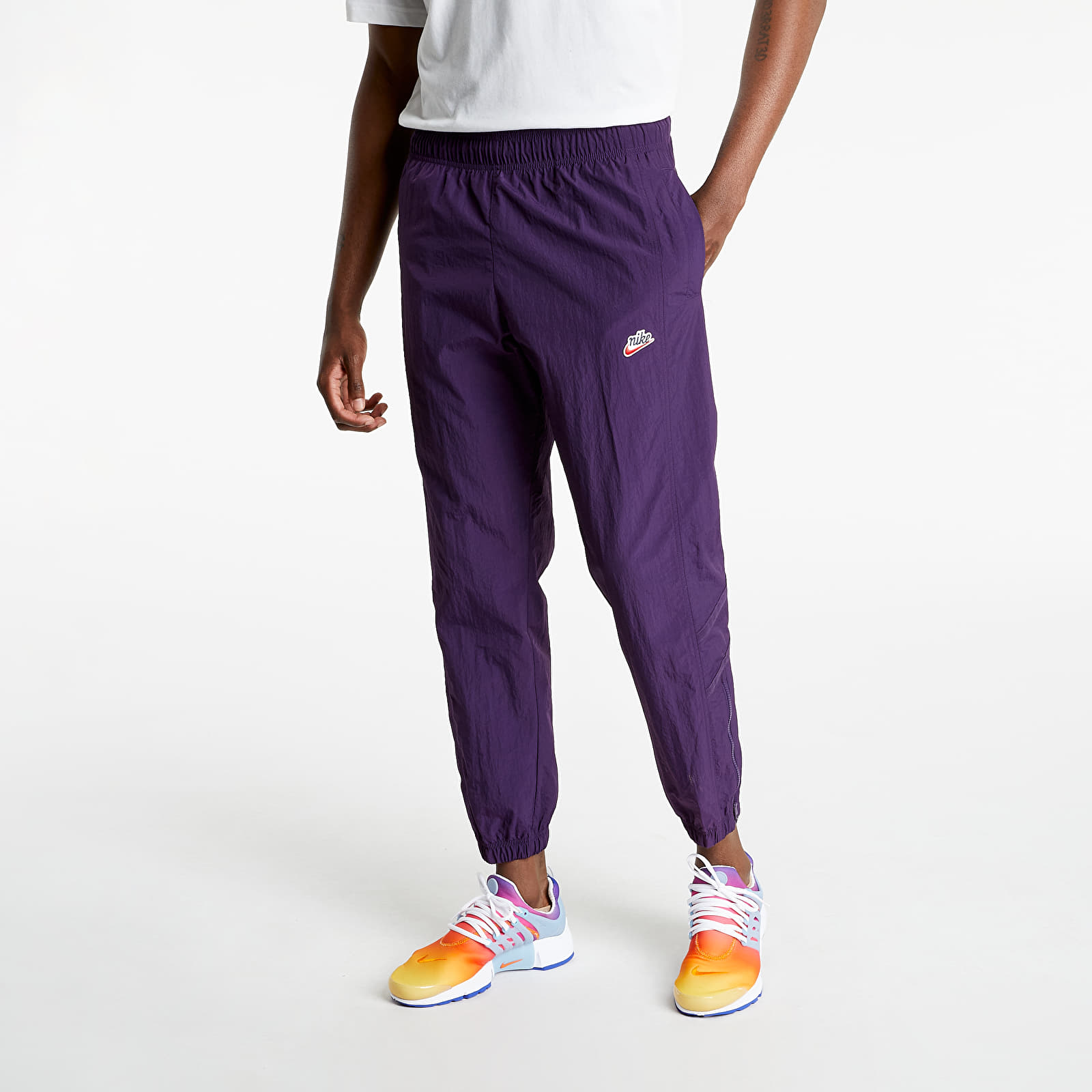 Дънки и панталони Nike NSW Heritage Windrunner + Lnd Woven Pants Purple 767560