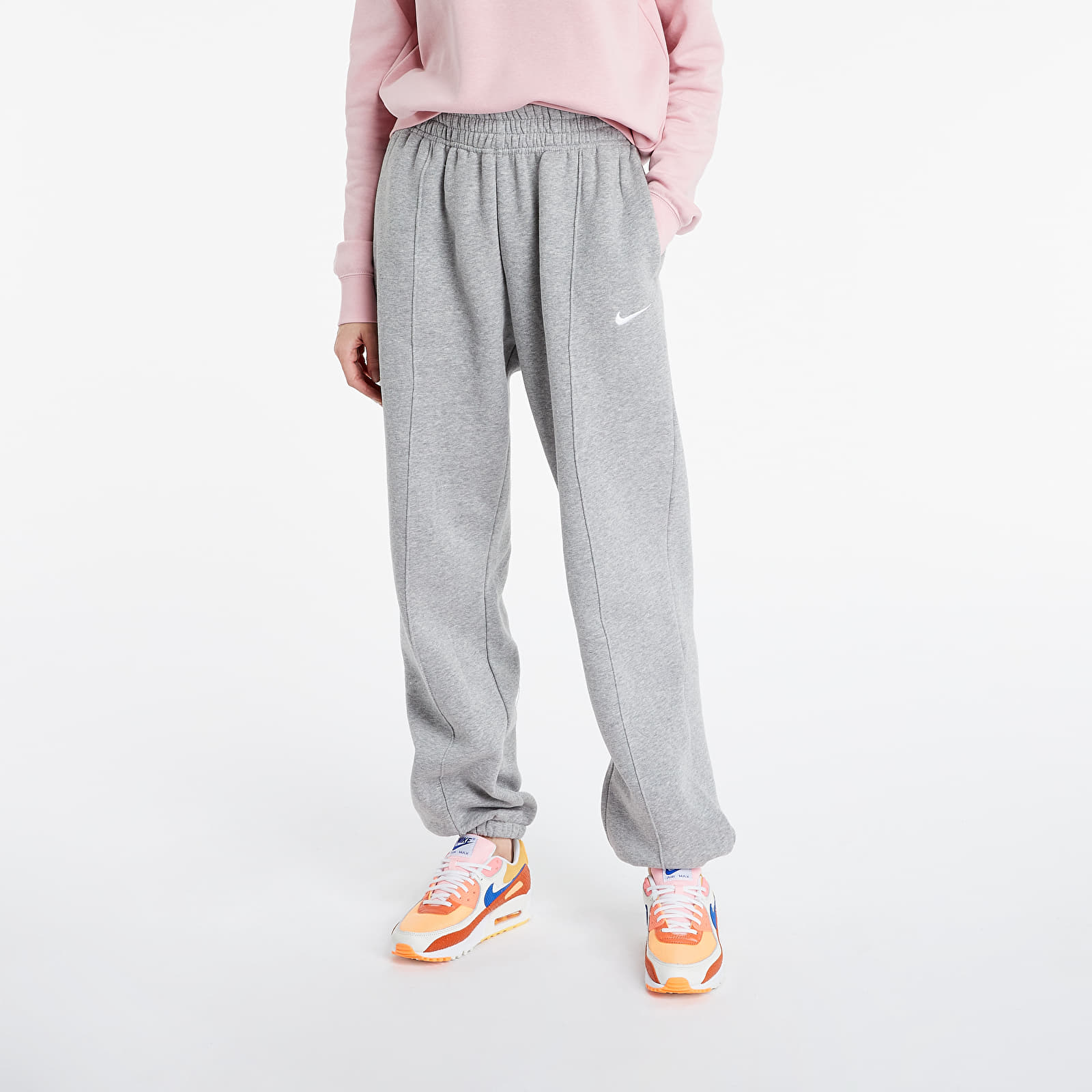 Дънки и панталони Nike Sportswear W Essential Fleece Pants Dk Grey Heather/ White 722434