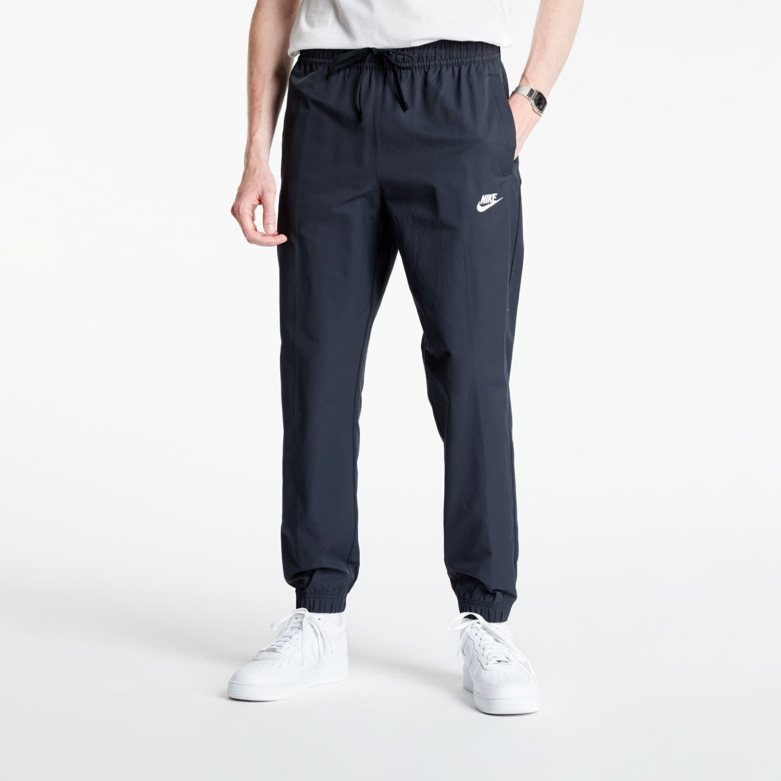 Дънки и панталони Nike Sportswear Men’s Unlined Cuff Pants Black/ White 810034